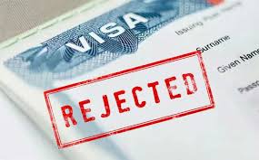 Close up of a visa stampAI-generated content may be incorrect.